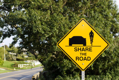 Share the road sign